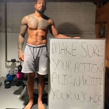 Eddie beside a whiteboard that reads Make sure your actions align with your words